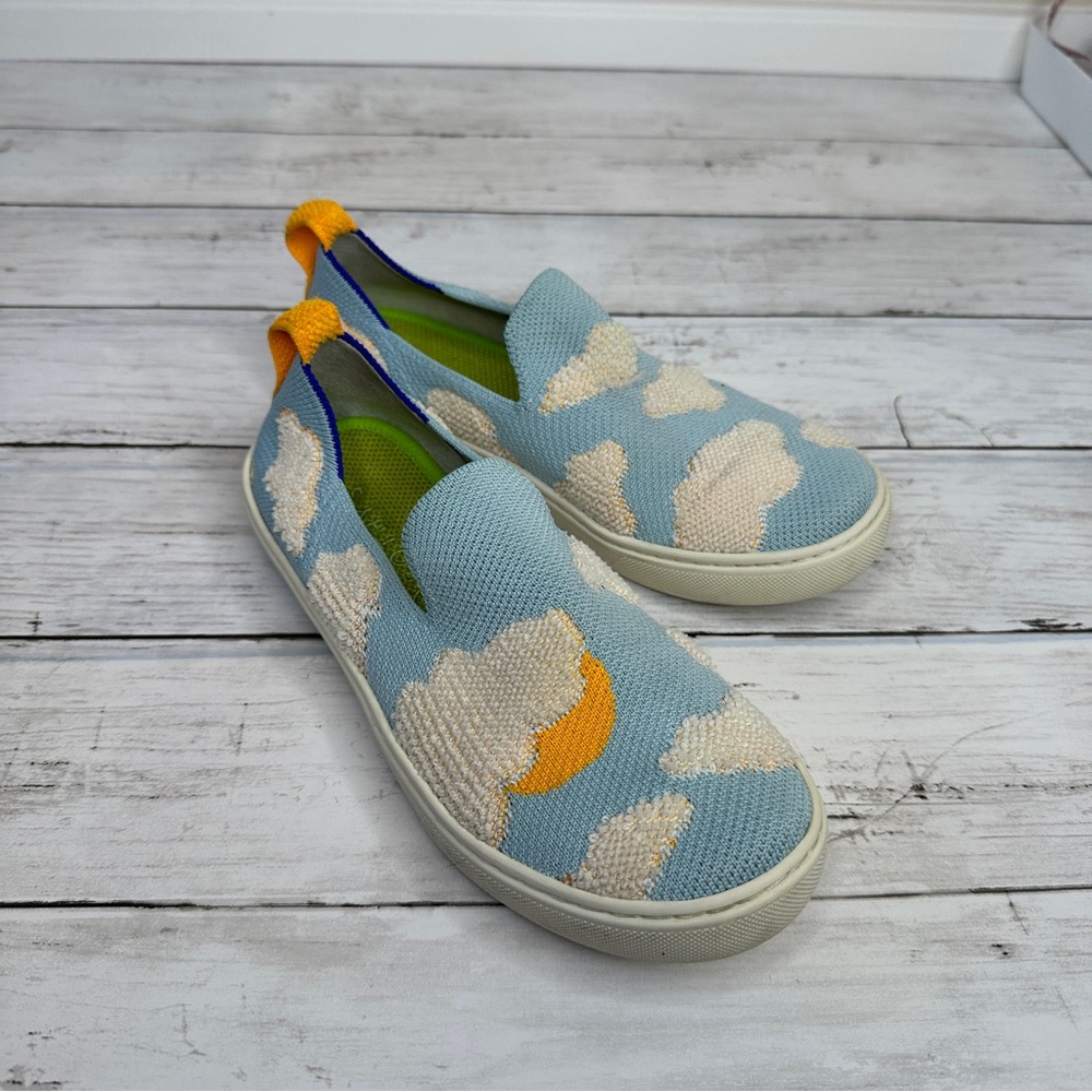 Rothy’s blue cloud pattern sneakers with sun